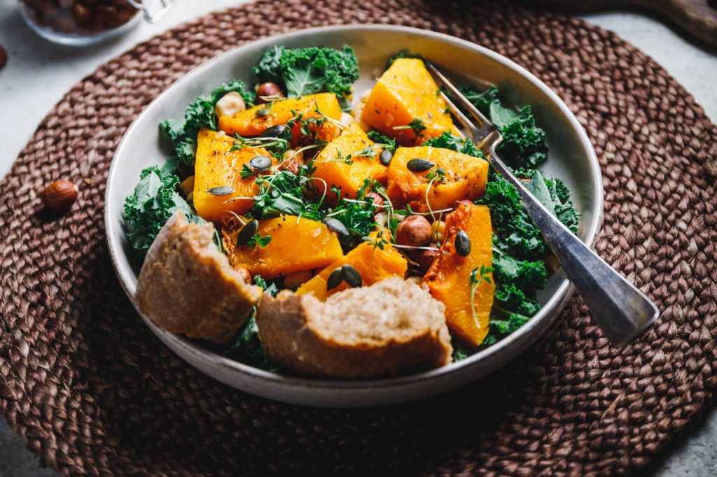 Season salad with grilled pumpkin, kale, chickpea, pepitas and nuts